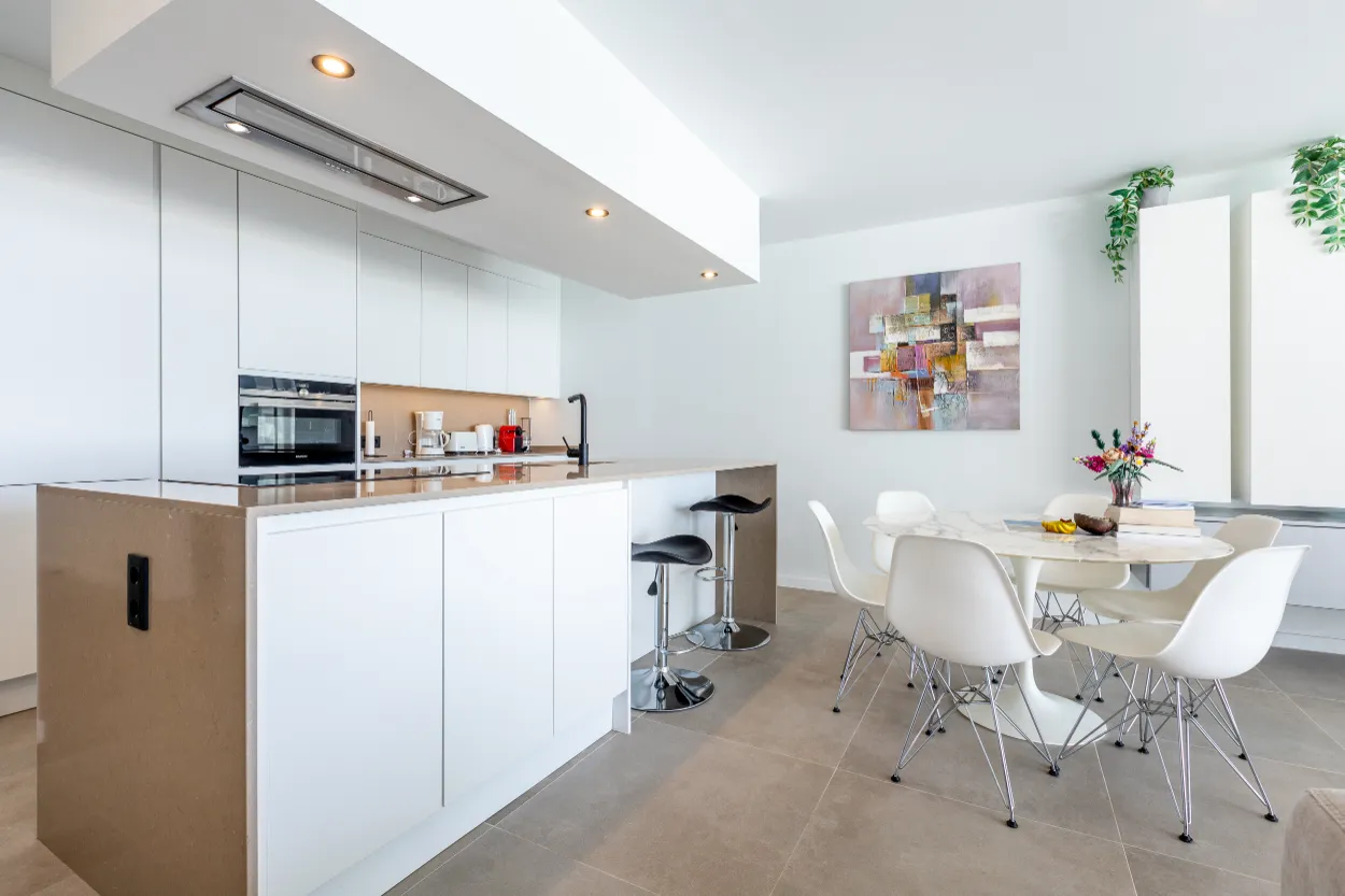 Vista del Silencio - white-kitchen-with-dining-area